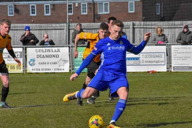 Dan Lawlor's penalty gives Peterborough Sports the lead over Aylesbury. Photo: James Richardson.