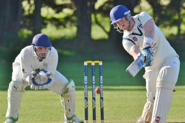 Bourne captain Peter Morgan in action.