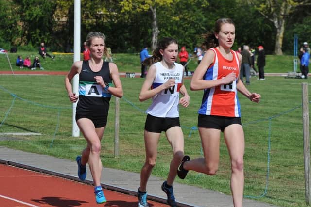 Molly Peel running in the 3,000m for Nene Valley Harriers.
