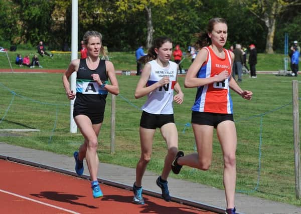 Molly Peel running in the 3,000m for Nene Valley Harriers.