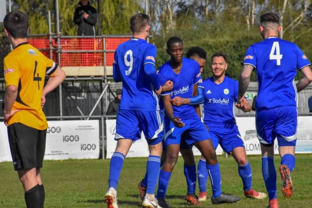 Henry Nkobi celebrates his debut goal for Peterborough Sports against Aylesbury United. Photo: James Richardson.
