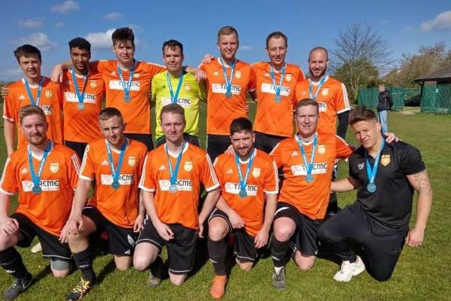 Thorney FC with their Peterborough Premier Division runners-up medals.