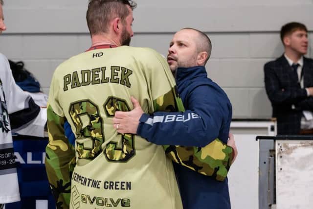 Man-of-the-match Ales Padelek is consoled by head coach Slava Koulikov after the Hull defeat.