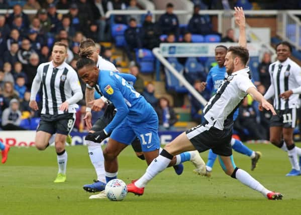 Ivan Toney in action for Posh against Gillingham earlier this month,