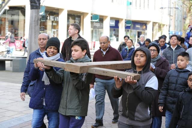 Good Friday Walk of Witness parade and service at Cathedral Square EMN-180330-155025009