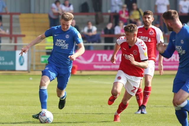 Posh centre-back Josh Knight on the ball against Fleetwood. Photo: Joe Dent/theposh.com.