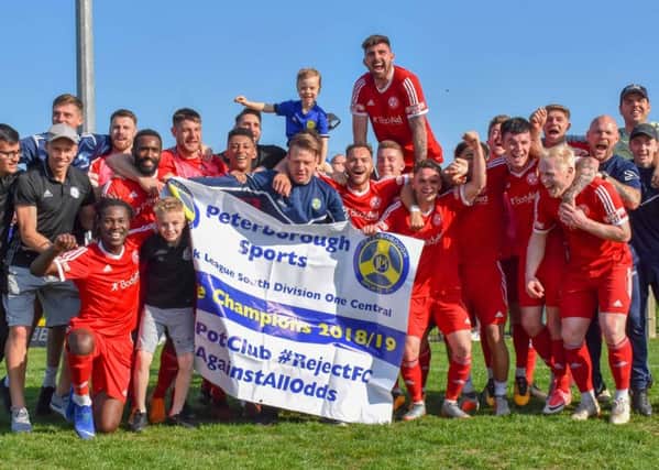 Peterborough Sports celebrate their title success. Photo: James Richardson.