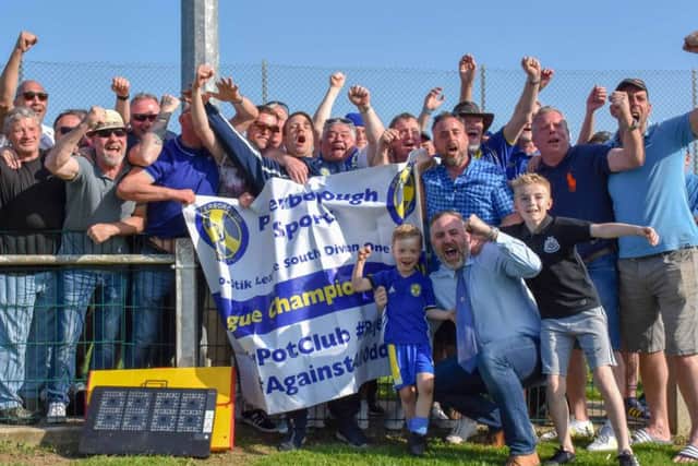 The supporters of Peterborough Sports celebrate the club's title success. Photo: James Richardson.