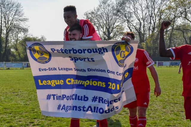 Peterborough Sports players celebrate their title success. Photo: James Richardson.