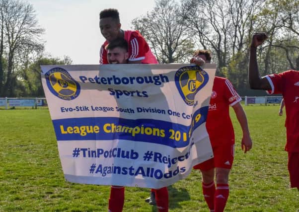 Peterborough Sports players celebrate their title success. Photo: James Richardson.