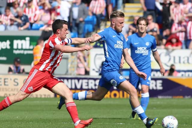 George Cooper in action for Posh against Sunderland. Photo: Joe Dent/theposh.com.