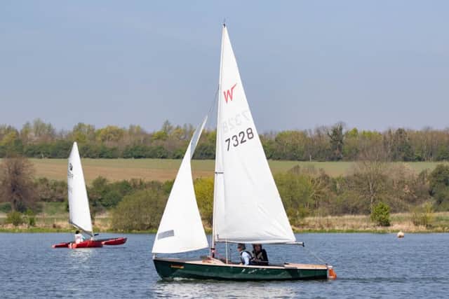 People enjoying the hot weather at Nene Park on
Saturday.
Picture by Terry Harris