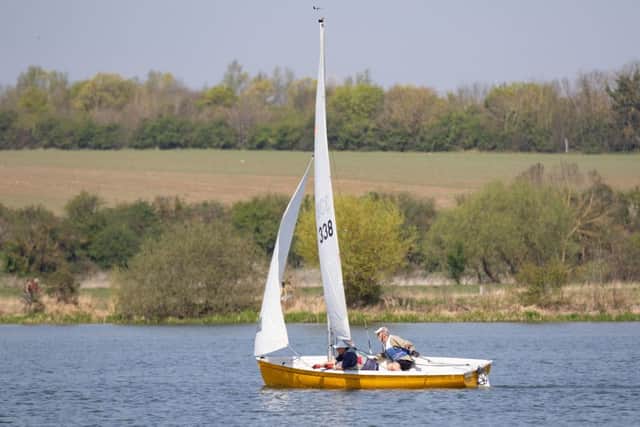 People enjoying the hot weather at Nene Park on Saturday. Photo: Terry Harris