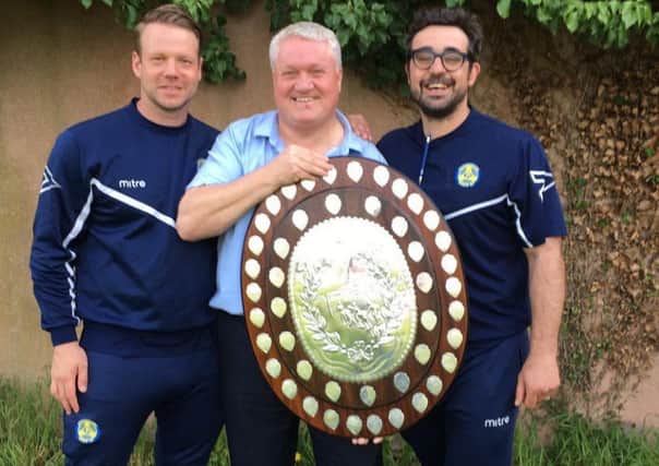 Peterborough Sports visionary Stephen 'Tommy' Cooper with manager Jimmy Dean (left) and assistant manager Dan Ruscillo (right).