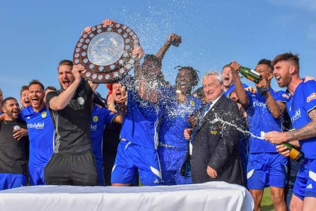 Peterborough Sports with the Evo Stik Southern League Division One Central trophy. Photo: James Richardson.