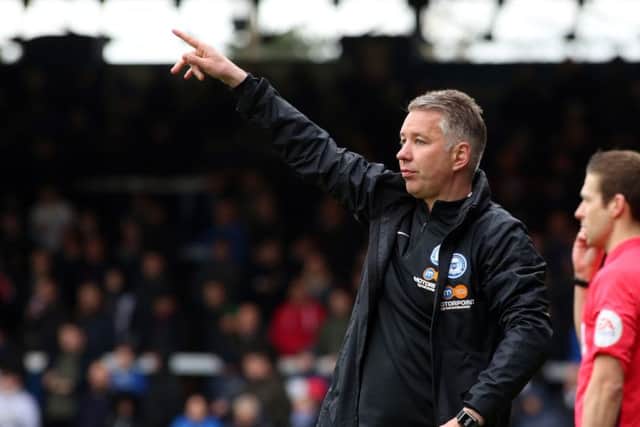 Can manager Darren Ferguson direct Posh to the play-offs?