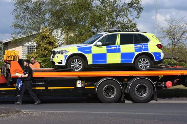 A police car being recovered