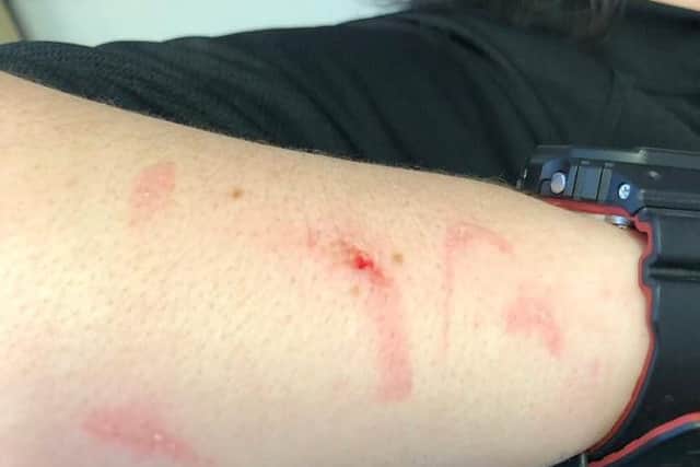 The marks on the arm of the transport police officer. Photo: British Transport Police