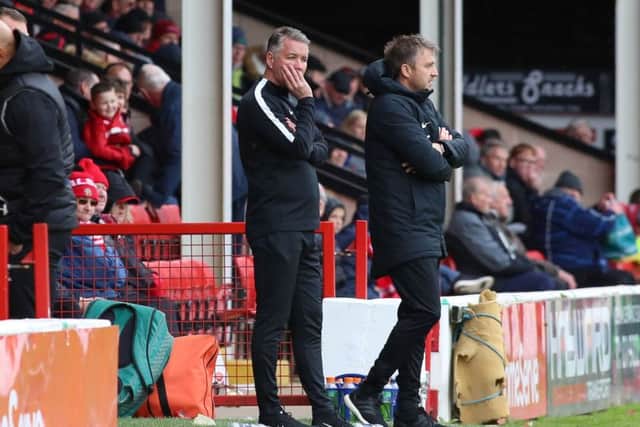 Posh boss Darren Ferguson and his assistant Gavin Strachan probably can't believe what they are watching at Walsall. Photo: Joe Dent/theposh.com.