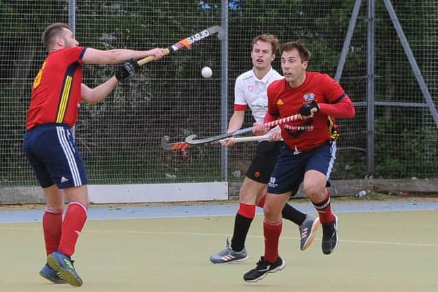Action from City of Peterborough (red) v Bowden. Photo: David Lowndes.
