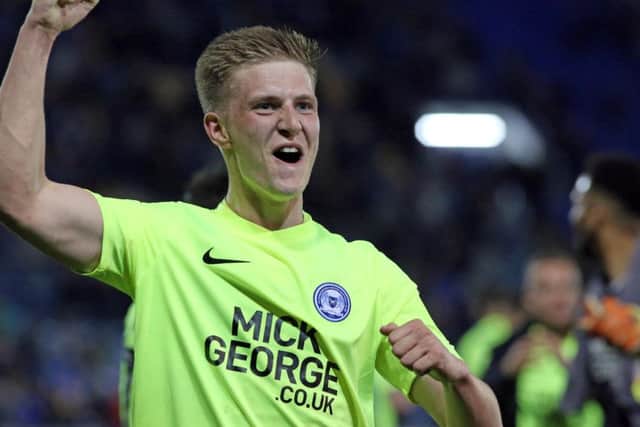 Josh Knight celebrates a 3-2 Posh win at Portsmouth. Photo: Joe Dent/theposh.com.