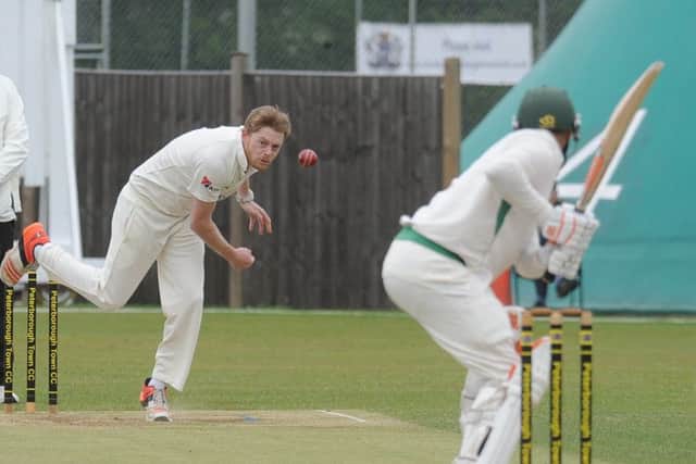 Peterborough Town bowler Mark Edwards in action.