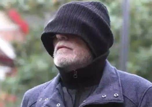 Bob Higgins arrives at a previous court hearing