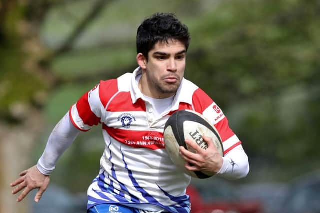 Lions' Argentinian scrum-half Franco Perticaro on the run against Wharfedale. Picture: Mick Sutterby