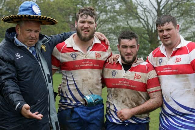 Lions president Mick Royal after the Waharfedale game with brothers Tom, Jack and Martin Lewis. Picture: Mick Sutterby