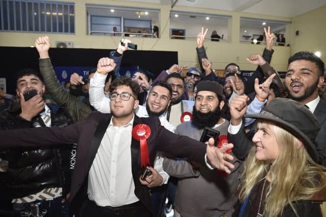 Labour celebrate during the announcement of results at The Cresset