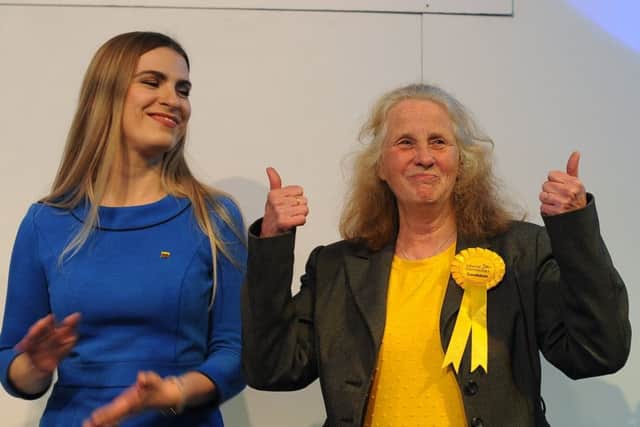 Sandra Bond (right) celebrates