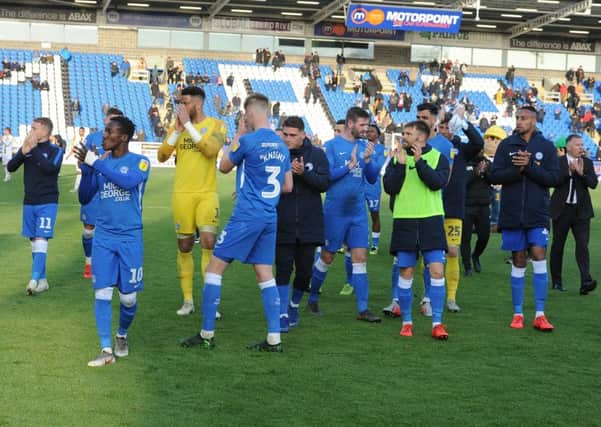 Posh players on their lap of appreciation after their 3-1 win on the final day of the season against Burton. Photo: David Lowndes.