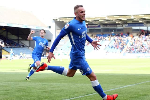 Joe Ward celebrates the opening goal of the game against Burton. Photo: Joe Dent/theposh.com.