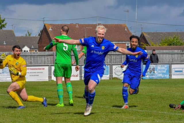 Lewis Hilliard celebrates the opening goal for Peterborough Sports against Blackfield & Langley. Photo: James Richardson.