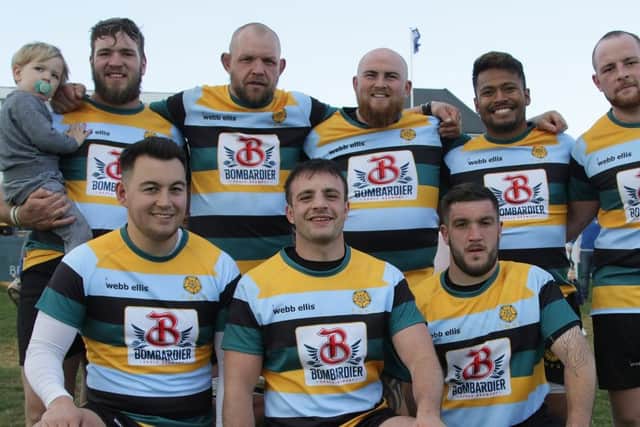 The Lions players who played for East Midlands. From the left they are, back, Tom Lewis, Marius Andrijauskas, Charley Robinson, Suva Ma'asi, Josh Waller, front, Kaz Henderson, Nico Defeo and Jack Lewis. Picture: Mick Sutterby