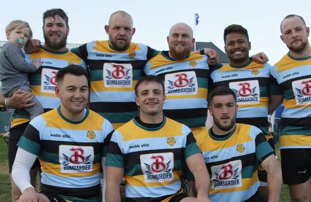The Lions players who played for East Midlands. From the left they are, back, Tom Lewis, Marius Andrijauskas, Charley Robinson, Suva Ma'asi, Josh Waller, front, Kaz Henderson, Nico Defeo and Jack Lewis. Picture: Mick Sutterby