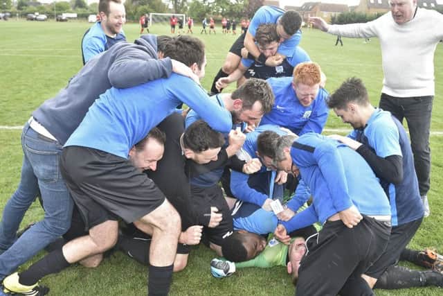 Premiair celebrate their Junior Cup Final success. Photo: David Lowndes.