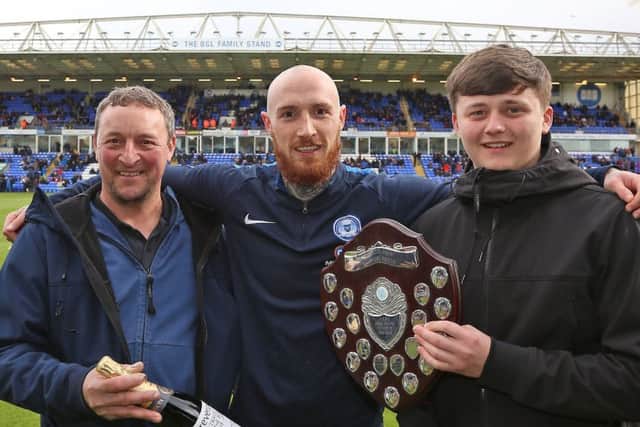 Marcus Maddison with one of his Posh player-of-the-year awards.