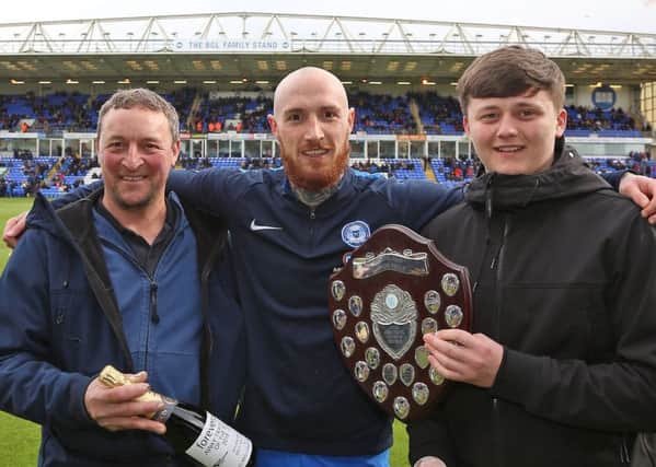 Marcus Maddison with one of his Posh player-of-the-year awards.