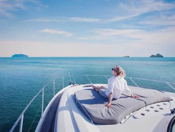The successful applicant will get to review yachts at destinations all around the world