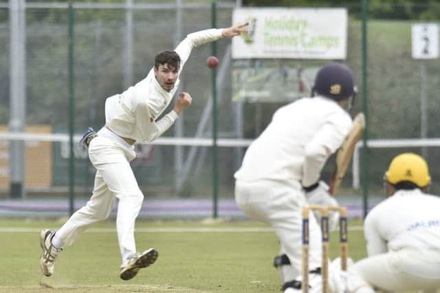 Josh Smith bowling for Peterborough Town against Horton House. Photo: David Lowndes.