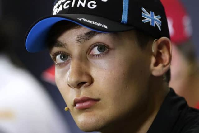 George Russell during a press conference in Barcelona.