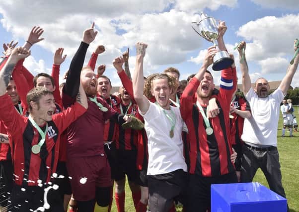Dreams Reserves FC celebrate their Peterborough Sunday Junior Cup FInal success. Photo: David Lowndes.