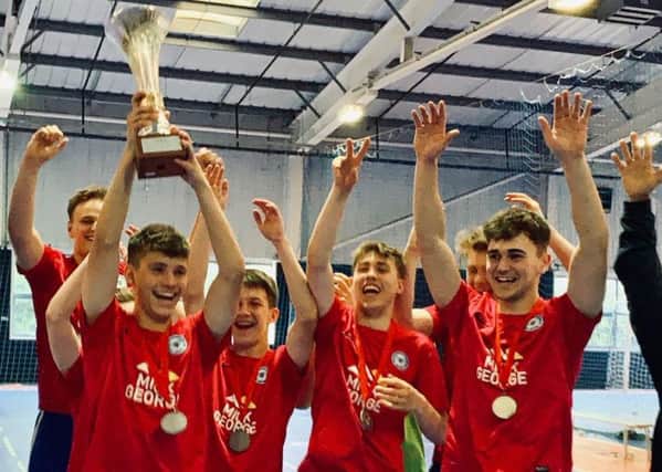 Posh celebrate their England Under 21 Deaf Futsal Championship win.