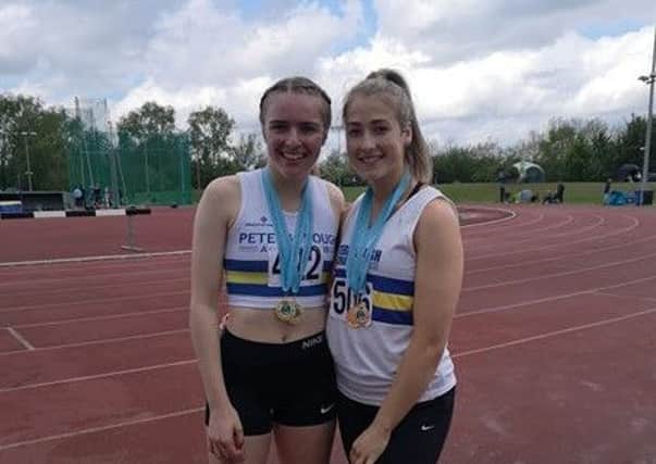 Double gold medal winners Elizabeth Taylor and Megan Sims.