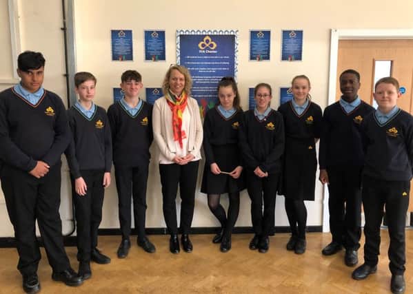 Clare Connor and students at Sawtry Village Academy.