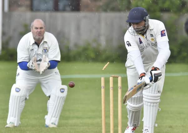 Sheikh CC's Ali Farqooq is bowled in the heavy defeat at Orton Park seconds. Photo: David Lowndes.