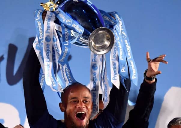 Manchester City skipper Vincent Kompany with the Premier League trophy.