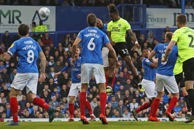 Ivan Toney scores with a thumping header at Portsmouth. Photo: Joe Dent/theposh.com.