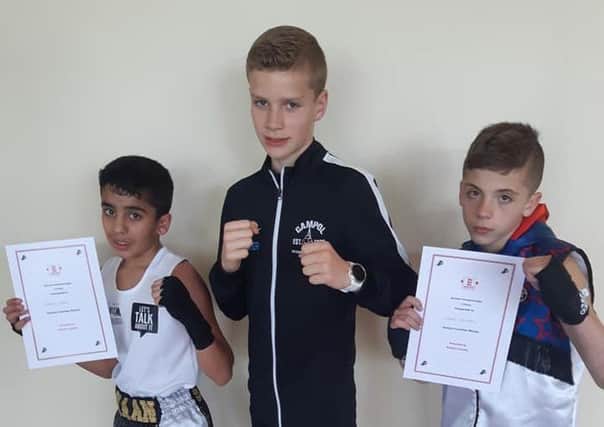 Peterborough Police ABC fighters on the National Schoolboy Championship trail. They are Imraan Shirazi, Alfie Baker and Shae Gowler.
